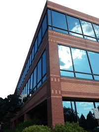 Professional pressure washing for offices and storefronts. Maintain a spotless commercial exterior with Aqua-Nomics' reliable cleaning solutions