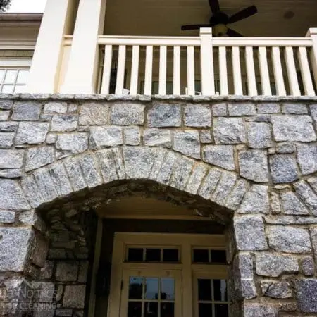 Aqua-Nomics restores HOA buildings by removing rust stains, delivering spotless and renewed exteriors for community clubhouses in Alpharetta