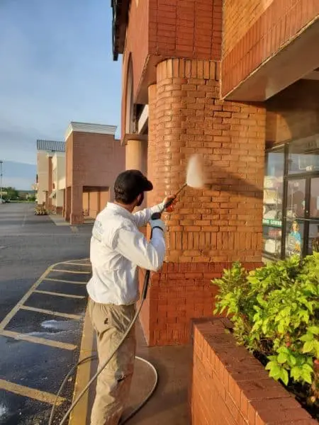 Aqua-Nomics removes dirt and stains from driveways restoring a clean look and improving your home's curb appeal