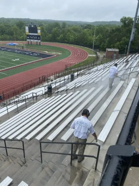 Aqua-Nomics restores roof surfaces removing stains and debris to enhance appearance and extend roof life