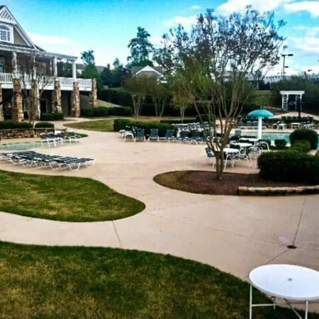 Clean poolside area after service Aqua-Nomics delivers pristine poolside areas after cleaning improving safety and curb appeal for residential and managed properties in Atlanta