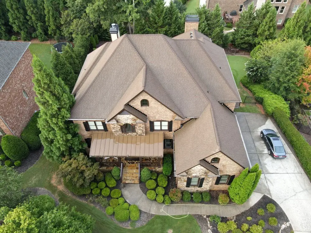 Cumming GA Roof Cleaning Results See the stunning results of roof cleaning in Cumming GA by Aqua-Nomics. Stain-free shingles restore your home’s beauty and prolong roof lifespan