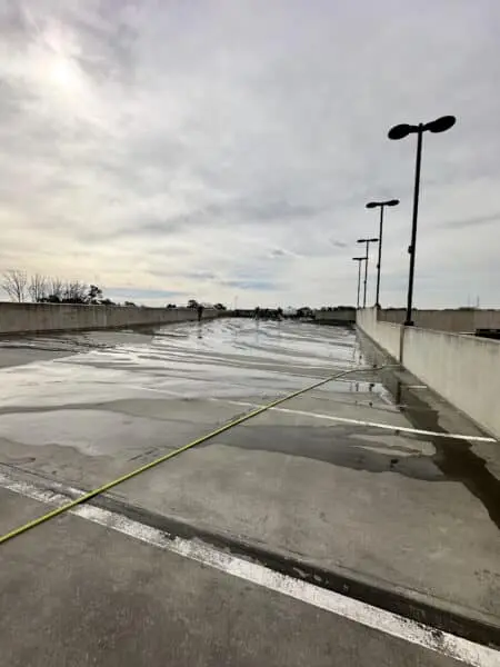 Freshly pressure washed parking deck in Alpharetta showcasing spotless concrete surface and improved cleanliness after professional commercial cleaning