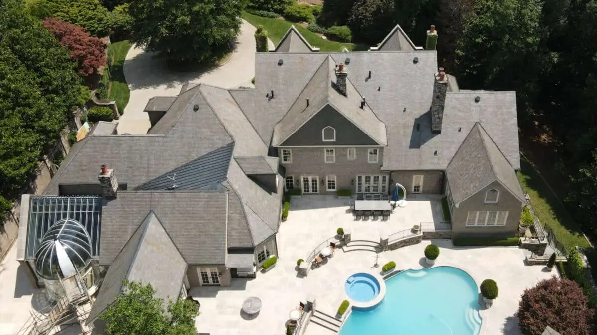 Protect and prolong your roof’s life using expert pressure washing techniques from Aqua-Nomics for a cleaner, more durable home exterior