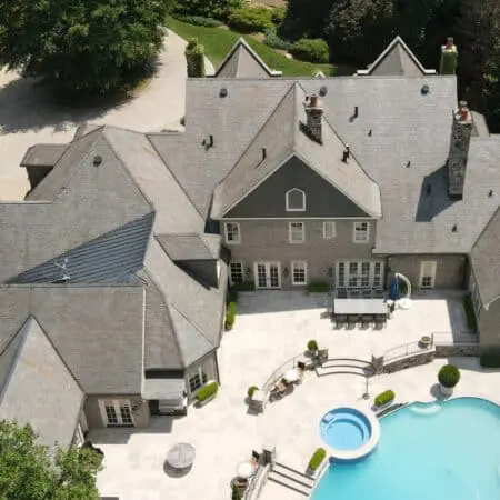 Clean and restored slate roof after professional washing—bright, stain-free finish by Aqua-Nomics