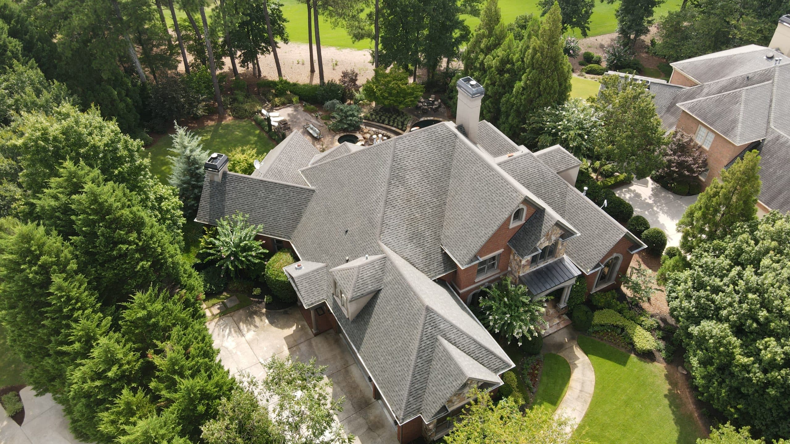 A House Surrounded By A Trees